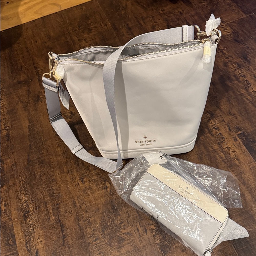 Kate Spade gray shoulder bag with gold zip and logo with matching wallet